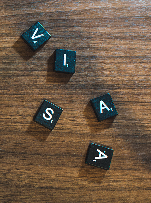 Letters scattered across a wood surface